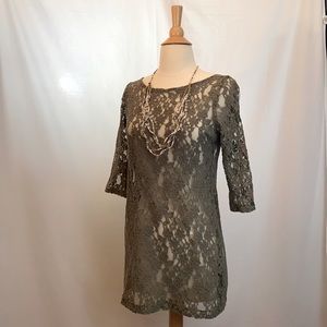 Boutique lace 3/4 sleeve tunic w low cut back. Flattering on all bodies. Olive